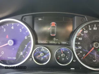2010 Volkswagen Touareg VR6 with VIN WVGBF7A97AD004355, listed as a Copart auction lot 52861335 with 129,454 mi miles and Salvage Title. Bid and sale history available at DreamBid. Image 9.