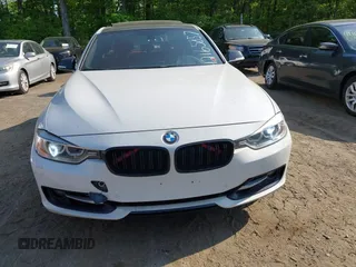 2013 BMW 3 Series 335i xDrive with VIN WBA3B9C54DF587421, listed as a IAAI auction lot 42165857 with 142,331 mi miles. Bid and sale history available at carsss.com. Image 12.