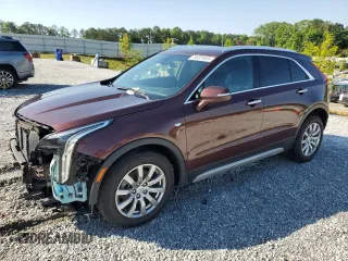 2023 Cadillac XT4 FWD Premium Luxury with VIN 1GYFZCR47PF163981, listed as a Copart auction lot 56824855 with 64,160 mi miles and Salvage title. Bid and sale history available at DreamBid. Image 1.