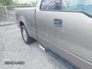 2004 Ford F-150 XL with VIN 1FTPX12584NA58780, listed as a IAAI auction lot 42123687 with 160,672 mi miles. Bid and sale history available at carsss.com. Image 6.