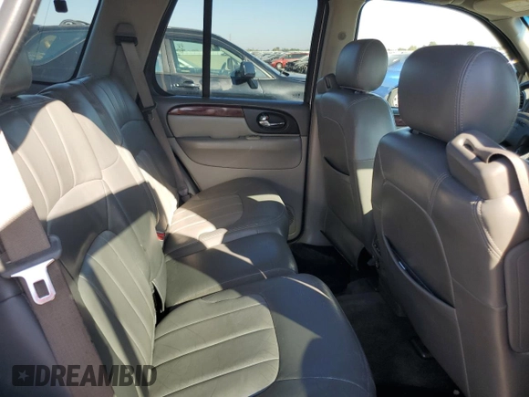 2002 GMC Envoy SLE z VIN 1GKDS13S822359901, wystawiony jako Copart lot #71940774 z przebiegiem 188 580 mil mil oraz Szkoda całkowita • Salvage title. Historia ofert i sprzedaży dostępna na DreamBid. Obrazek 10.