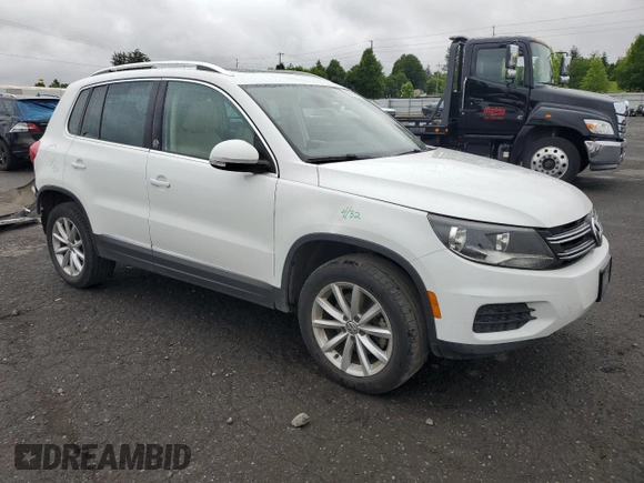 2017 Volkswagen Tiguan Wolfsburg Edition with VIN WVGRV7AX0HK003389, listed as a Copart auction lot 59709615 with 88,491 mi miles and Salvage title. Bid and sale history available at DreamBid. Image 4.