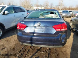 2015 Volkswagen Passat 2.0L TDI SE w/Sunroof with VIN 1VWBV7A34FC021031, listed as a IAAI auction lot 41601548 with 173,402 mi miles. Bid and sale history available at carsss.com. Image 16.