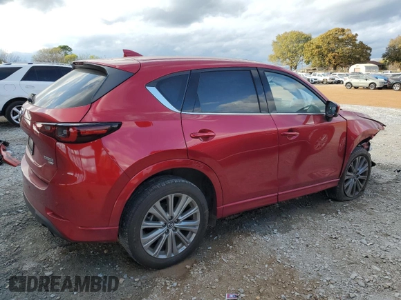 2023 Mazda CX-5 Signature with VIN JM3KFBXY4P0100652, listed as a Copart auction lot 82235664 with 29,344 mi miles and Salvage Title. Bid and sale history available at carsss.com. Image 3.