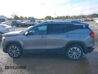 2019 GMC Terrain SLT with VIN 3GKALVEXXKL154174, listed as a IAAI auction lot 40586395 with 124,011 mi miles. Bid and sale history available at carsss.com. Image 14.
