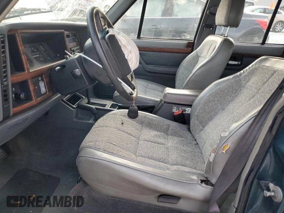 1996 Jeep Cherokee Country with VIN 1J4FJ78S7TL242853, listed as a Copart auction lot 73022554 with 84,868 mi miles and Salvage Title. Bid and sale history available at carsss.com. Image 7.