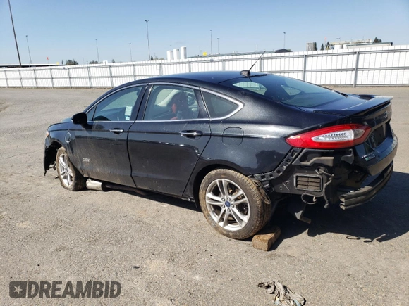 2015 Ford Fusion Energi Titanium with VIN 3FA6P0SU9FR147017, listed as a Copart auction lot 51545365 with 147,241 mi miles and Salvage Title. Bid and sale history available at carsss.com. Image 2.