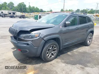 2020 Jeep Cherokee Trailhawk with VIN 1C4PJMBX5LD530720, listed as a IAAI auction lot 42404948 with 99,606 mi miles and . Bid and sale history available at DreamBid. Image 17.