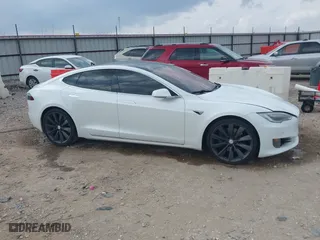 2017 Tesla Model S 100D with VIN 5YJSA1E29HF204797, listed as a IAAI auction lot 41760296 with 92,587 mi miles. Bid and sale history available at carsss.com. Image 13.