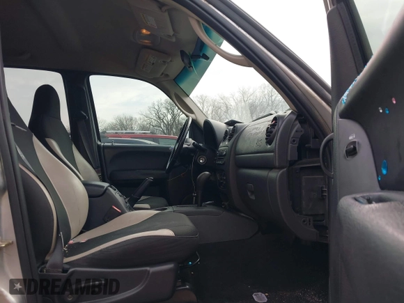 2003 Jeep Liberty Sport with VIN 1J4GL48K03W719229, listed as a IAAI auction lot 41130590 with 261,650 mi miles. Bid and sale history available at carsss.com. Image 5.