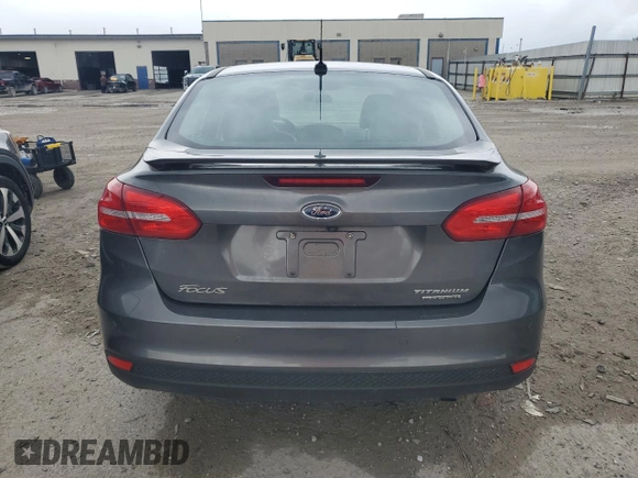 2015 Ford Focus Titanium с VIN 1FADP3J21FL254702, выставлен на аукционе Copart как лот 59872395 с пробегом 93 195 миль миль и Списание • Salvage title. История ставок и продаж доступна на DreamBid. Изображение 6.