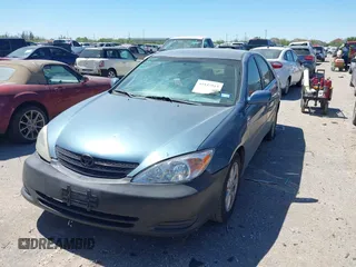 2004 Toyota Camry LE z VIN 4T1BE32K74U915657, wystawiony jako IAAI lot #41837915 z przebiegiem 260 096 mil mil oraz . Historia ofert i sprzedaży dostępna na DreamBid. Obrazek 2.