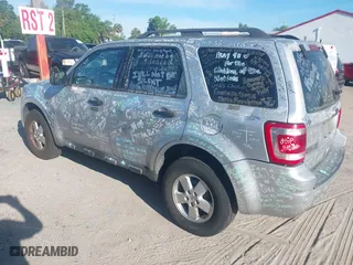 2010 Ford Escape XLT with VIN 1FMCU0D7XAKD16869, listed as a IAAI auction lot 41884141 with 145,781 mi miles. Bid and sale history available at carsss.com. Image 3.
