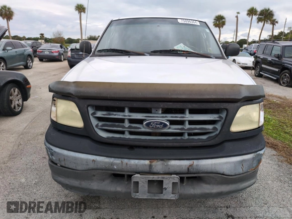 2003 Ford F-150 XL with VIN 1FTRF17W03NA02988, listed as a Copart auction lot 77209084 with Not Provided miles and Salvage Title. Bid and sale history available at DreamBid. Image 5.