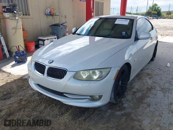 2011 BMW 3 Series 328i with VIN WBAKE3C53BE557457, listed as a IAAI auction lot 41631581 with 112,272 mi miles and . Bid and sale history available at carsss.com. Image 2.