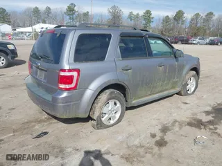 2008 Ford Escape XLT with VIN 1FMCU03178KA47527, listed as a IAAI auction lot 41672719 with 306,312 mi miles. Bid and sale history available at carsss.com. Image 4.