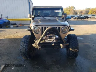 2004 Jeep Wrangler Rubicon with VIN 1J4FA69S74P787812, listed as a Copart auction lot 84715464 with 150,320 mi miles and Salvage Title. Bid and sale history available at carsss.com. Image 5.