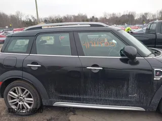 2019 MINI Countryman Cooper S with VIN WMZYT5C58K3J87679, listed as a IAAI auction lot 41711500 with 74,433 mi miles. Bid and sale history available at carsss.com. Image 13.