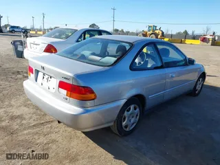 1998 Honda Civic EX with VIN 1HGEJ8145WL021907, listed as a IAAI auction lot 41759849 with 134,095 mi miles. Bid and sale history available at carsss.com. Image 4.