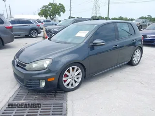 2010 Volkswagen GTI z VIN WVWGV7AJ1AW264214, wystawiony jako IAAI lot #42341801 z przebiegiem 165 464 mil mil oraz . Historia ofert i sprzedaży dostępna na DreamBid. Obrazek 2.