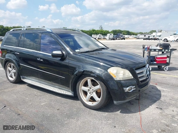 2009 Mercedes-Benz GL-Class 5.5L with VIN 4JGBF86E49A458359, listed as a IAAI auction lot 41808818 with 114,048 mi miles. Bid and sale history available at carsss.com. Image 1.