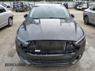 2015 Ford Fusion SE with VIN 3FA6P0H72FR190227, listed as a Copart auction lot 60090595 with 111,197 mi miles and Salvage title. Bid and sale history available at DreamBid. Image 5.