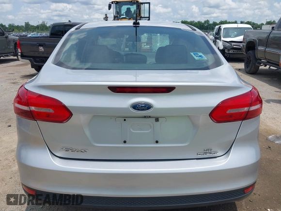 2016 Ford Focus SE with VIN 1FADP3F26GL351775, listed as a IAAI auction lot 42424733 with 164,886 mi miles and . Bid and sale history available at DreamBid. Image 16.