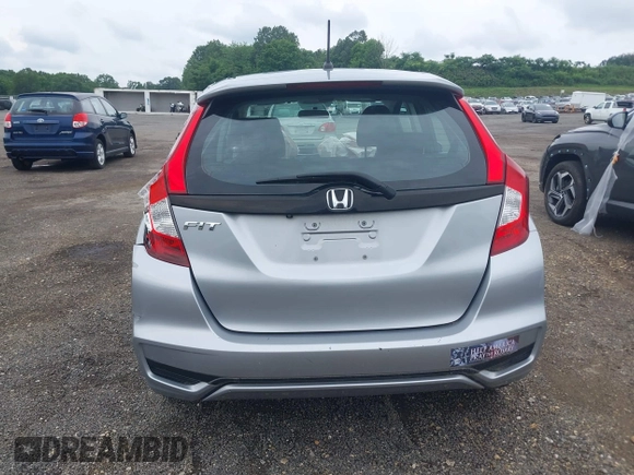2019 Honda Fit LX z VIN 3HGGK5H45KM725916, wystawiony jako IAAI lot #42654907 z przebiegiem 92 580 mil mil oraz . Historia ofert i sprzedaży dostępna na DreamBid. Obrazek 16.