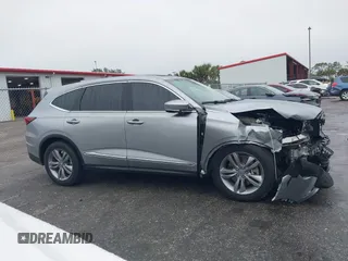 2022 Acura MDX z VIN 5J8YD9H36NL006581, wystawiony jako IAAI lot #41399264 z przebiegiem 41 090 mil mil oraz . Historia ofert i sprzedaży dostępna na DreamBid. Obrazek 13.