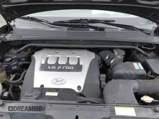 2007 Hyundai Tucson SE with VIN KM8JN72D67U501956, listed as a IAAI auction lot 41513205 with 165,071 mi miles and . Bid and sale history available at DreamBid. Image 10.