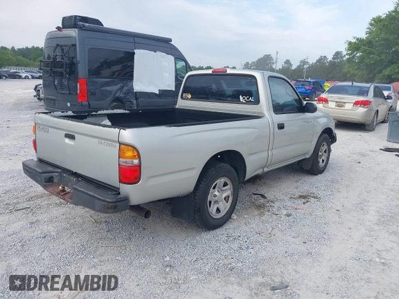 2003 Toyota Tacoma with VIN 5TENL42N63Z199086, listed as a IAAI auction lot 42084151 with 153,977 mi miles and . Bid and sale history available at DreamBid. Image 4.