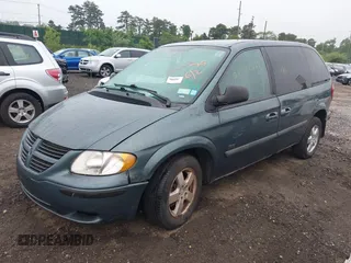 2005 Dodge Caravan SXT with VIN 1D4GP45R55B279825, listed as a IAAI auction lot 42532684 with 157,167 mi miles and . Bid and sale history available at DreamBid. Image 2.