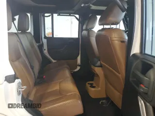 2015 Jeep Wrangler Unlimited Sahara с VIN 1C4HJWEG0FL560973, выставлен на аукционе Copart как лот 59552135 с пробегом 135 057 миль миль и Чистый • Clean title. История ставок и продаж доступна на DreamBid. Изображение 11.