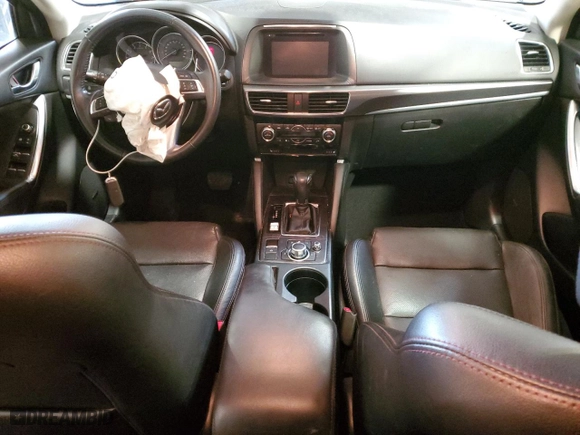 2016 Mazda CX-5 Grand Touring with VIN JM3KE4DY6G0725413, listed as a Copart auction lot 51985445 with 177,633 mi miles and Salvage Title. Bid and sale history available at carsss.com. Image 8.