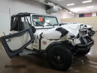 1990 Jeep Wrangler S with VIN 2J4FY19E8LJ541713, listed as a Copart auction lot 60809655 with 134,077 mi miles and Clean title. Bid and sale history available at DreamBid. Image 4.