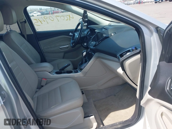 2013 Ford Escape SEL with VIN 1FMCU9H99DUA74813, listed as a IAAI auction lot 42070945 with 187,417 mi miles and . Bid and sale history available at DreamBid. Image 5.