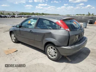 2004 Ford Focus ZX3 with VIN 3FAFP31Z64R123057, listed as a Copart auction lot 50514905 with 187,941 mi miles and Salvage title. Bid and sale history available at DreamBid. Image 2.