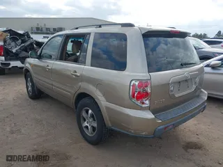 2006 Honda Pilot EX-L with VIN 5FNYF28586B039412, listed as a IAAI auction lot 41543393 with 223,685 mi miles. Bid and sale history available at carsss.com. Image 3.