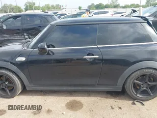 2019 MINI Hardtop Cooper S z VIN WMWXP7C56K2A49415, wystawiony jako IAAI lot #41952188 z przebiegiem 143 633 mil mil oraz . Historia ofert i sprzedaży dostępna na DreamBid. Obrazek 14.