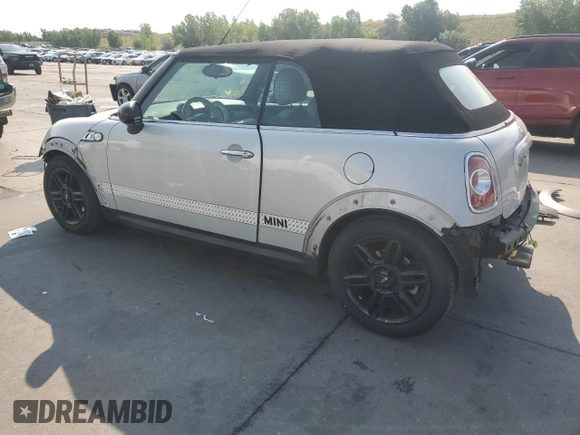 2012 MINI Convertible S z VIN WMWZP3C51CT296464, wystawiony jako Copart lot #64290005 z przebiegiem 107 580 mil mil oraz Szkoda całkowita • Salvage title. Historia ofert i sprzedaży dostępna na DreamBid. Obrazek 2.
