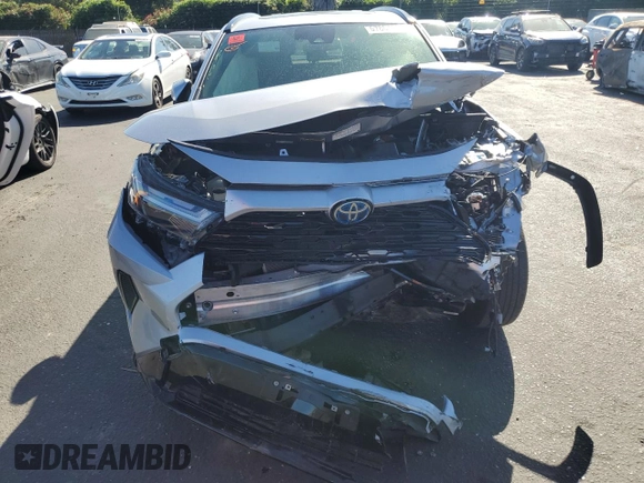 2022 Toyota RAV4 Hybrid SE with VIN JTM16RFV7ND066541, listed as a Copart auction lot 57804595 with Not provided miles and Salvage title. Bid and sale history available at DreamBid. Image 5.