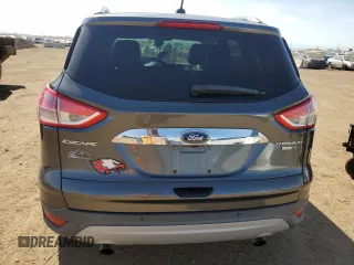 2016 Ford Escape Titanium with VIN 1FMCU9J96GUC63384, listed as a Copart auction lot 52255725 with 136,869 mi miles and Salvage Title. Bid and sale history available at carsss.com. Image 6.