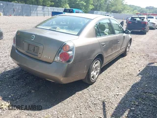 2002 Nissan Altima SL z VIN 1N4AL11D72C183312, wystawiony jako IAAI lot #42425412 z przebiegiem 167 195 mil mil oraz . Historia ofert i sprzedaży dostępna na DreamBid. Obrazek 4.