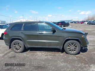 2016 Jeep Grand Cherokee Laredo z VIN 1C4RJFAG2GC454861, wystawiony jako IAAI lot #41964977 z przebiegiem 180 592 mil mil oraz . Historia ofert i sprzedaży dostępna na DreamBid. Obrazek 13.