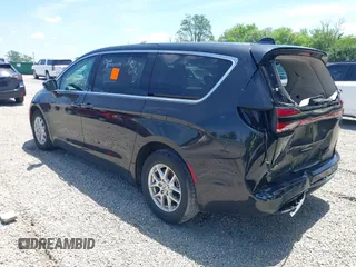 2023 Chrysler Pacifica Touring L with VIN 2C4RC1BG1PR606504, listed as a IAAI auction lot 42647652 with 41,598 mi miles and . Bid and sale history available at DreamBid. Image 3.