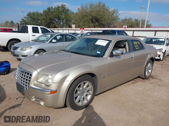 2006 Chrysler 300 C with VIN 2C3KA63HX6H487887, listed as a IAAI auction lot 41603068 with 133,169 mi miles. Bid and sale history available at carsss.com. Image 2.