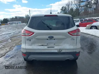 2014 Ford Escape SE with VIN 1FMCU9GX7EUD76778, listed as a IAAI auction lot 41679482 with 136,832 mi miles and . Bid and sale history available at carsss.com. Image 17.
