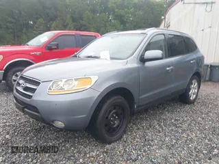 2009 Hyundai Santa Fe SE z VIN 5NMSH13E19H239066, wystawiony jako IAAI lot #42218941 z przebiegiem 127 640 mil mil oraz . Historia ofert i sprzedaży dostępna na DreamBid. Obrazek 2.