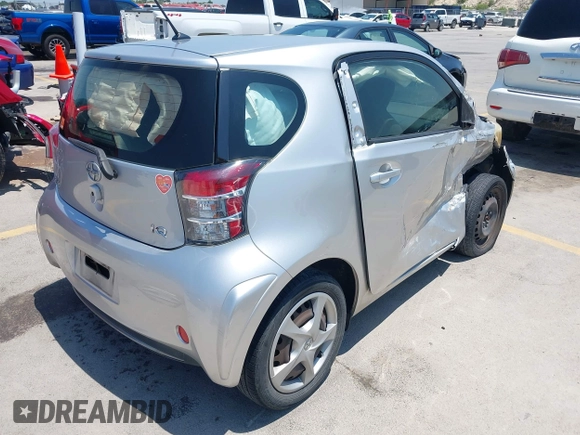 2012 Scion iQ with VIN JTNJJXB07CJ018562, listed as a IAAI auction lot 42404672 with 79,867 mi miles and . Bid and sale history available at DreamBid. Image 4.