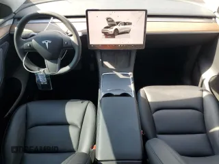 2024 Tesla Model Y с VIN 7SAYGDED6RF109727, выставлен на аукционе Copart как лот 59038725 с пробегом 14 948 миль миль и Списание • Salvage title. История ставок и продаж доступна на DreamBid. Изображение 8.